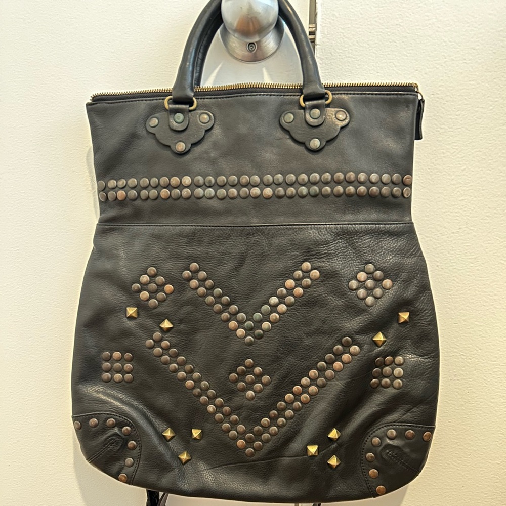 Prüne (from Argentina) black studded leather cross body bag